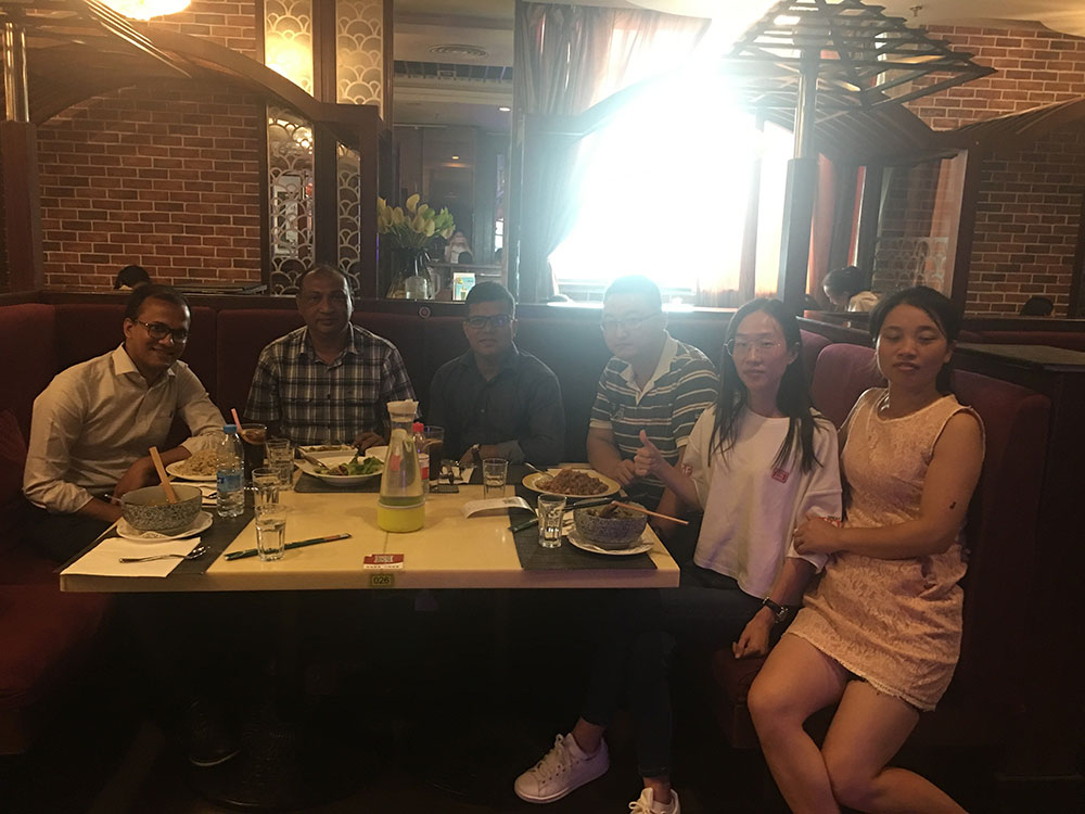 Bangladesh Government Officer Examing Goods For Luggage Machine