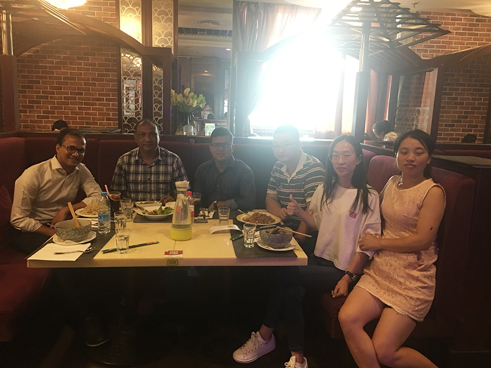 Bangladesh Government Officer Examing Goods For Luggage Machine